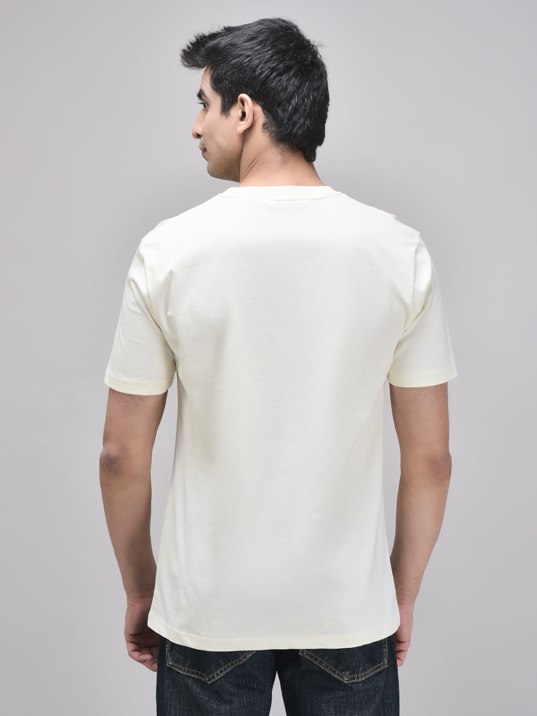 Back view of unisex beige oversized t-shirt – no print, clean design