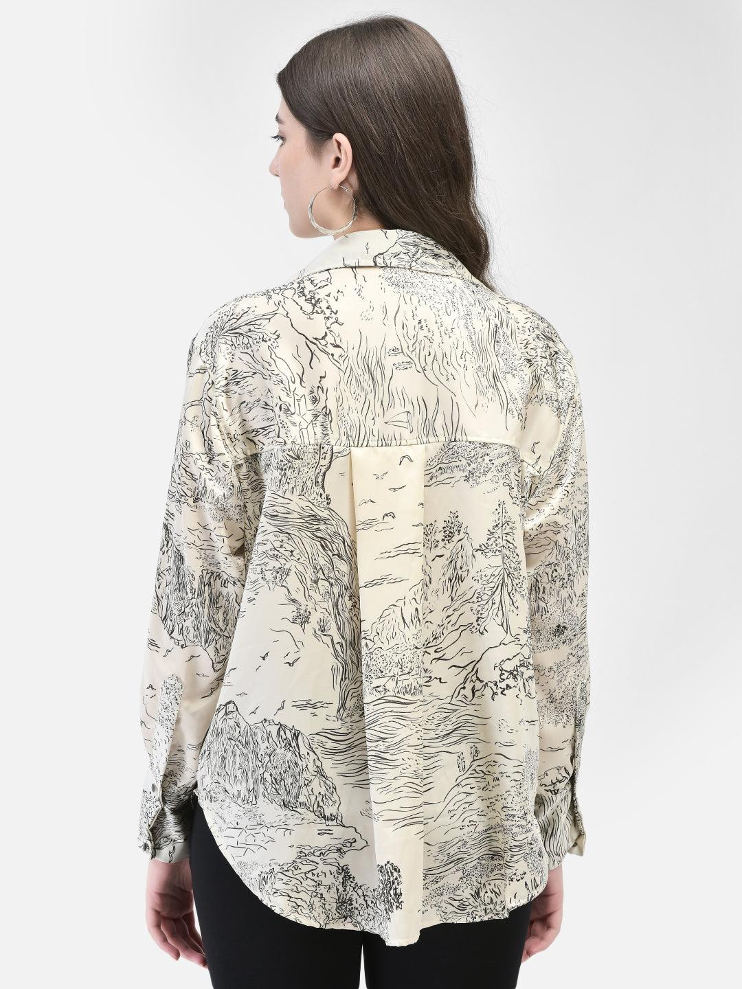 Backside view of beige satin printed shirt showing full sleeve and flowy fit on model