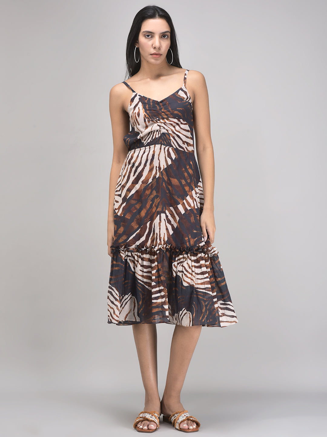 Beige brown summer sundress with leaf print