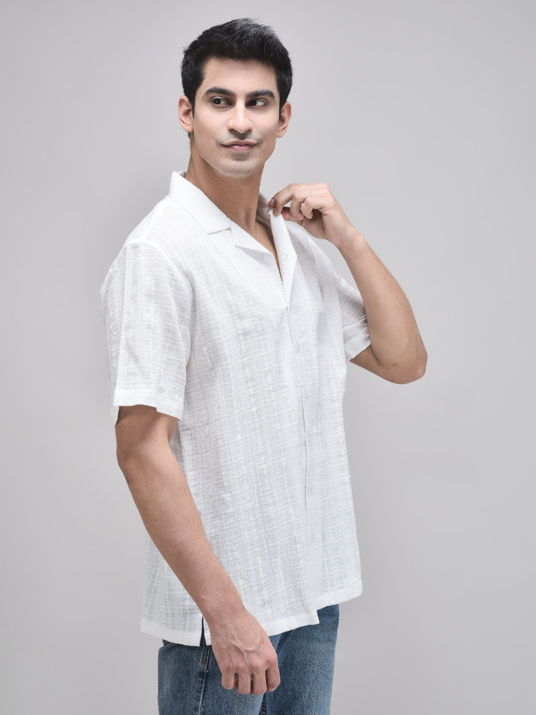 Side view of oversized white shirt – man lifting arm slightly