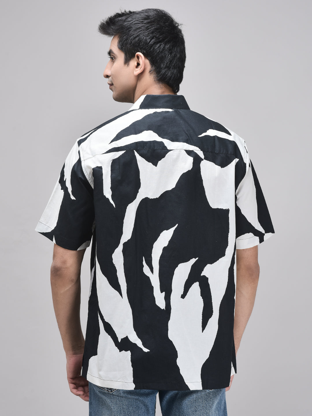 Back view of men’s oversized graphic shirt – abstract black and white design