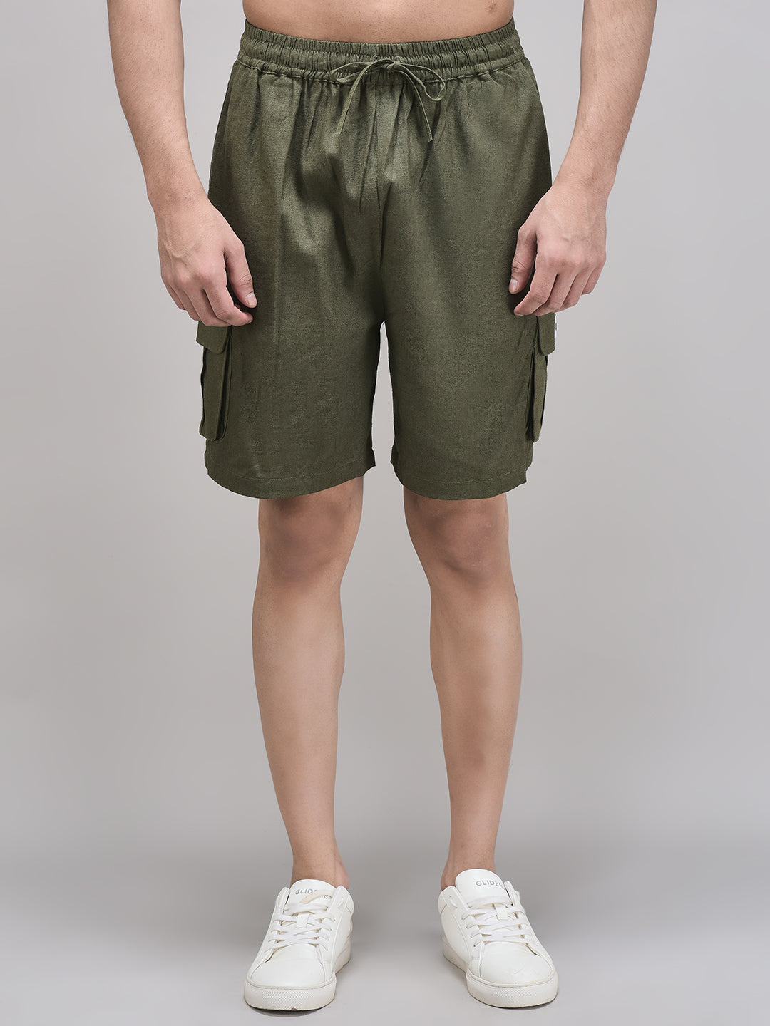 Front view of men’s olive linen cargo shorts