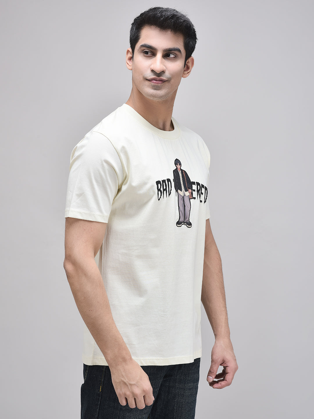 Unisex oversized beige t-shirt with cartoon graphic – front right angle
