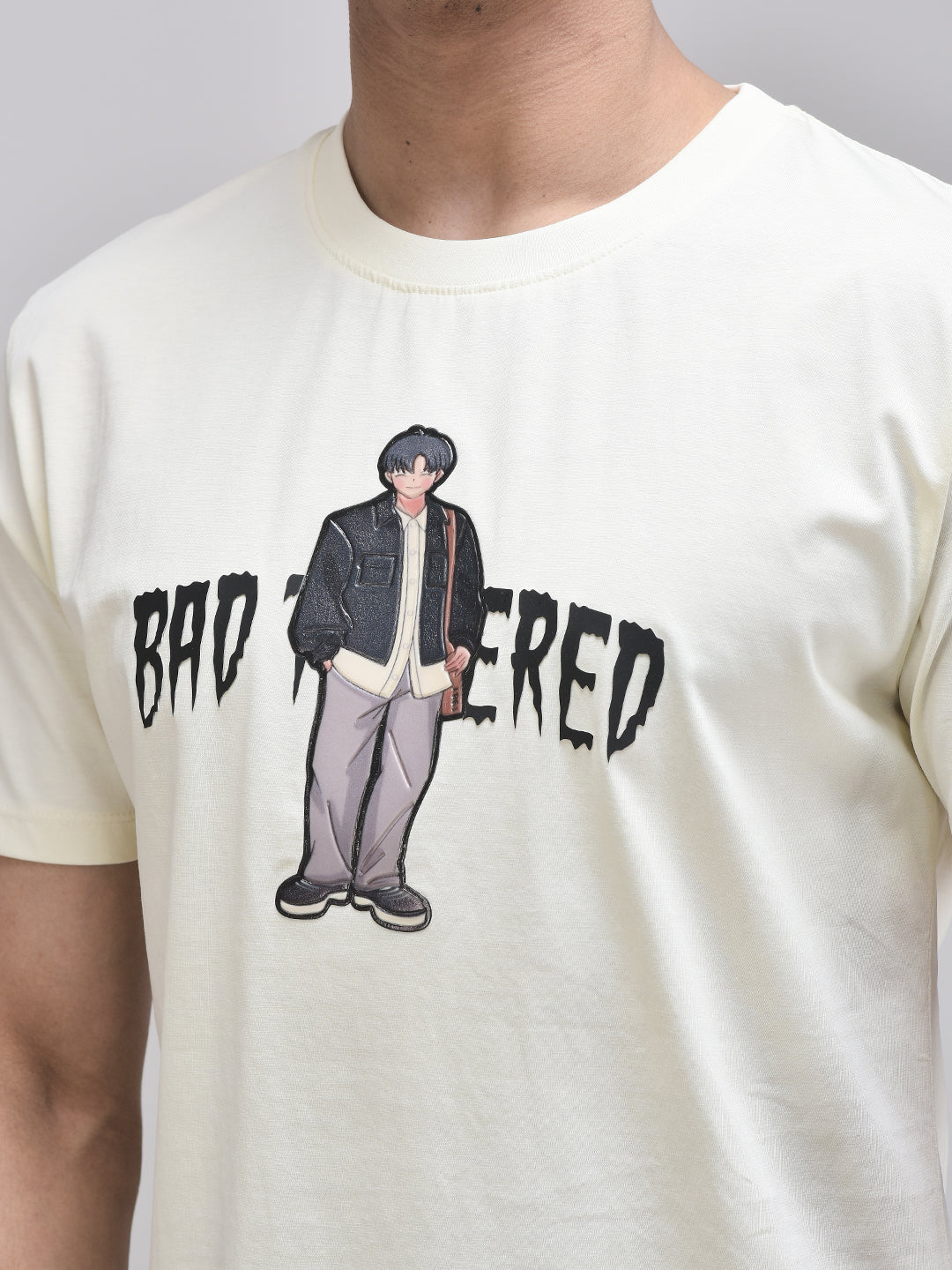 Zoomed-in view of Bad Tempered puff print on beige cotton t-shirt