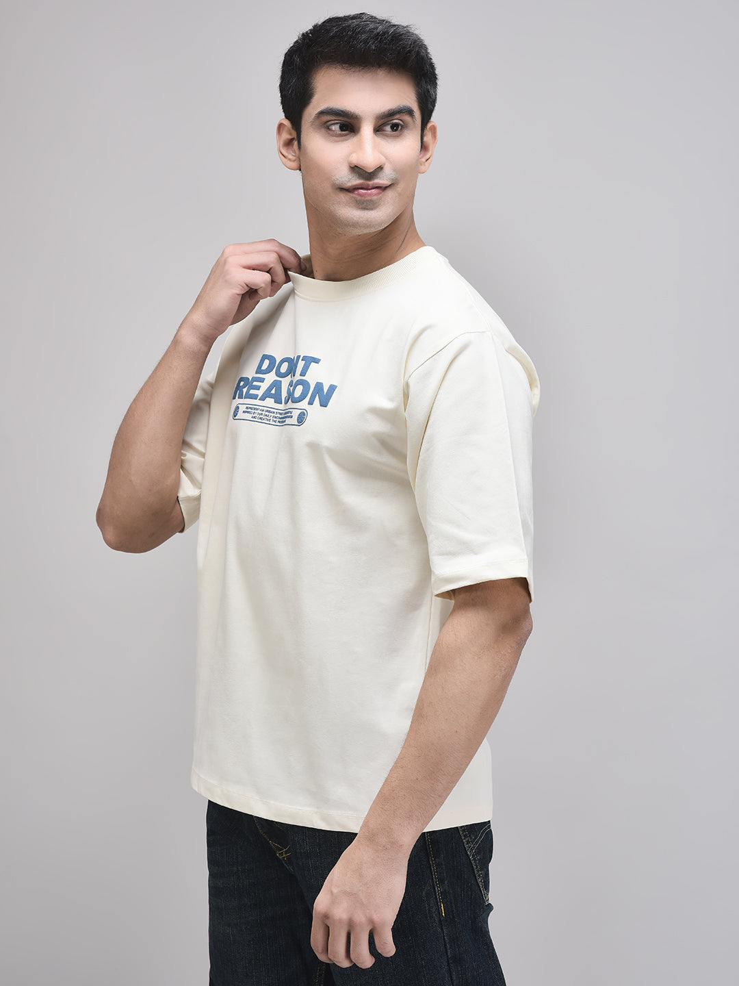 Unisex oversized beige t-shirt with front typography graphic