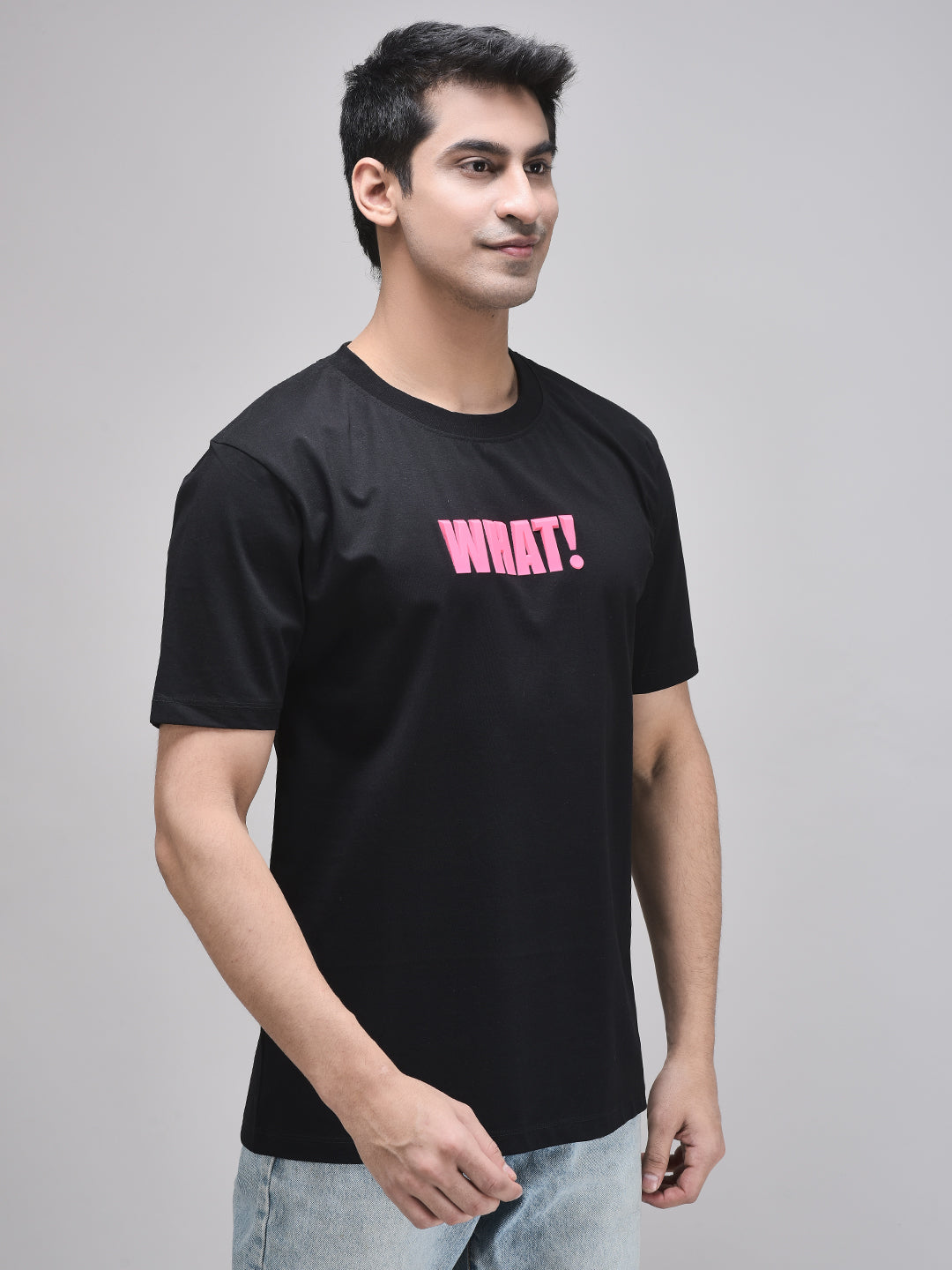 Side view of black oversized WHAT! t-shirt for men and women