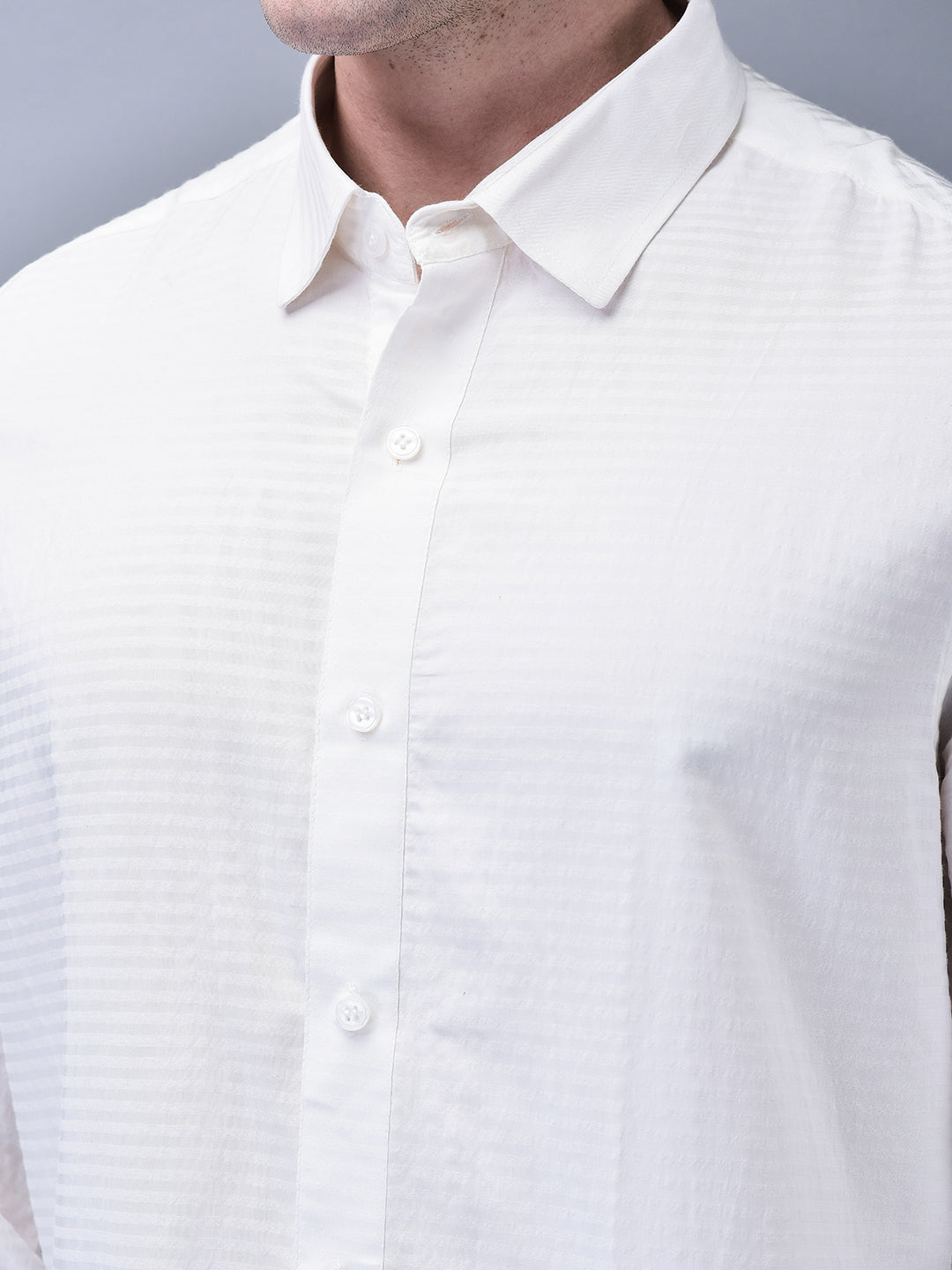 Close-up of shirt collar and textured cotton fabric – formal slim fit design