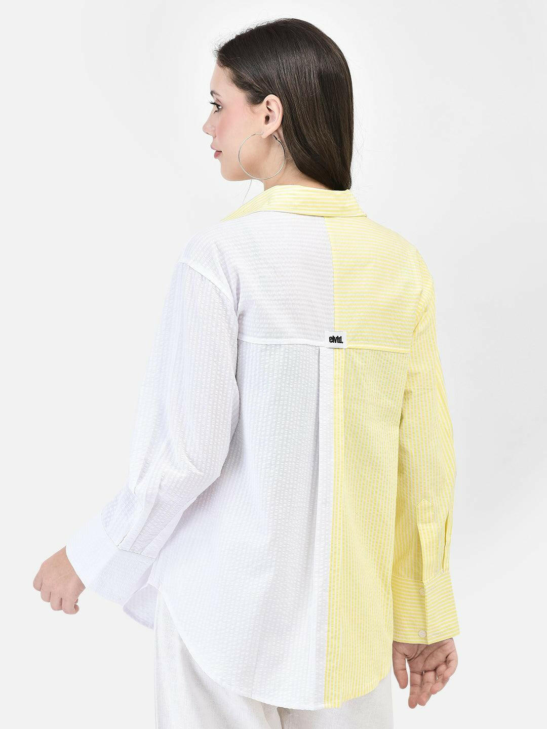 Back view of yellow cotton shirt – relaxed oversized silhouette