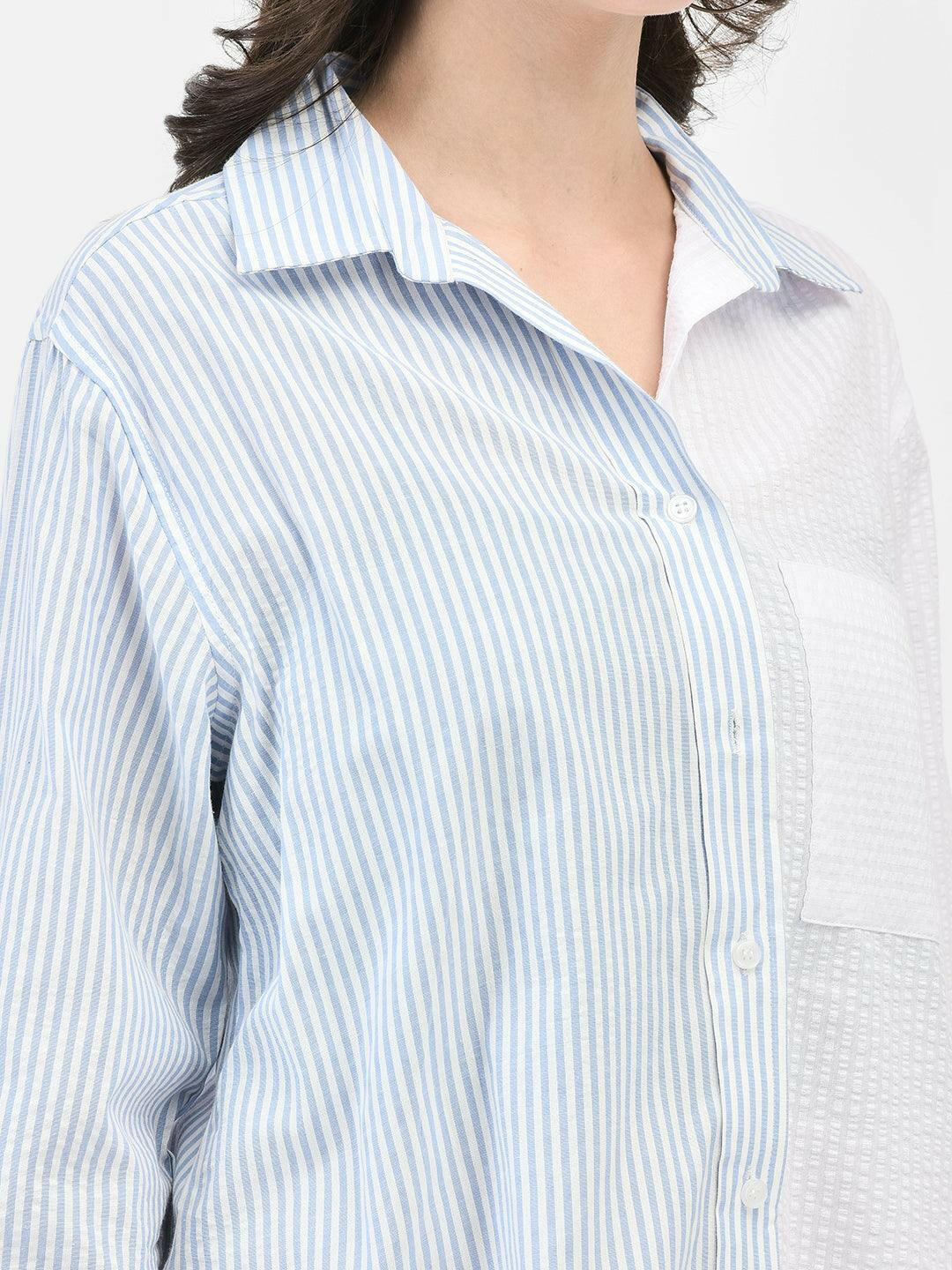 Close-up of collar and blue stripes – seersucker cotton fabric texture