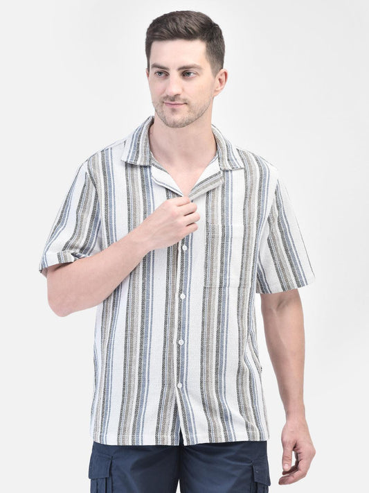 Front view of man in white striped shirt – hands at side, standing straight