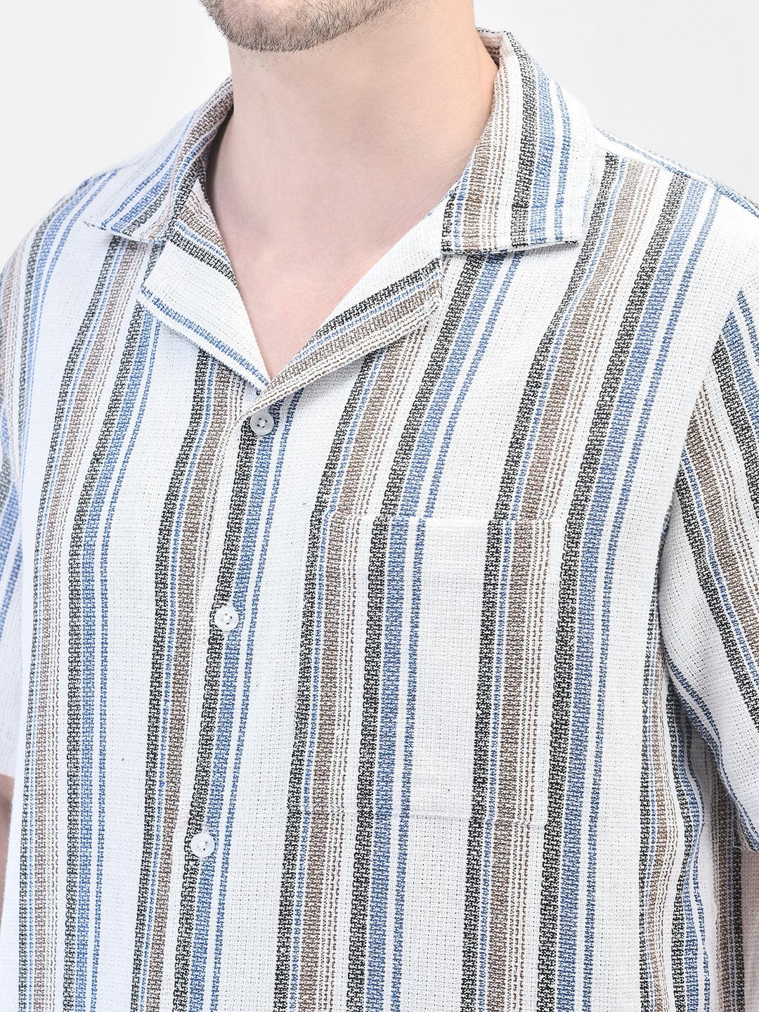 Close-up of collar and fabric texture – white cotton shirt with vertical stripes
